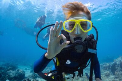 Baptism diving in the turquoise waters of Tahiti