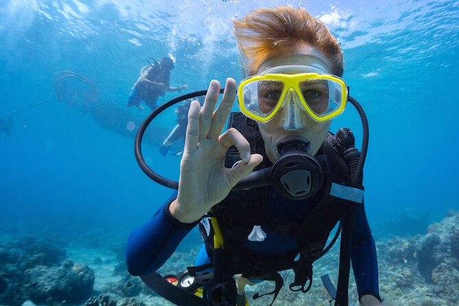 Baptism diving in the turquoise waters of Tahiti - The 2-hour timeline starting at 2:00 pm