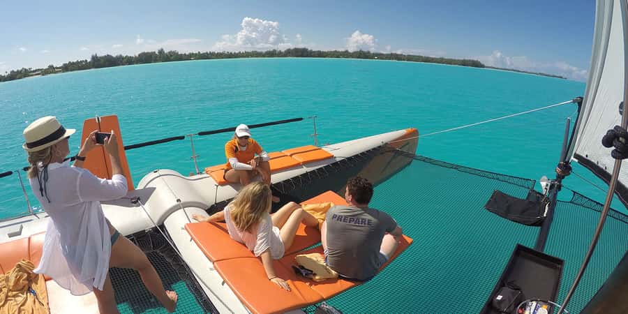 Bora Bora: Sunset Catamaran Cruise with Snacks and Drinks - From your hotel dock to the boat: how the 2-hour flow works