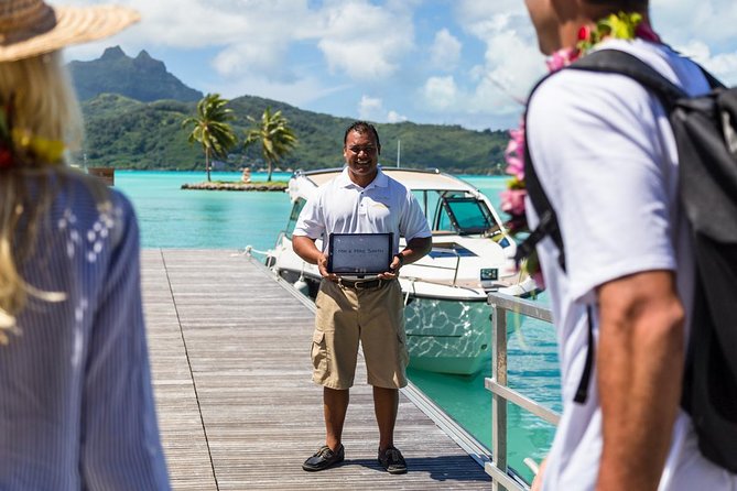 Bora Bora VIP Arrival Airport to Hotels Transfer - Meeting your captain: name sign, flower garland, and chilled welcome towel