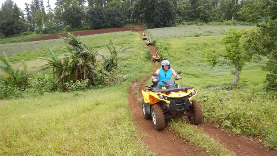 Mo'orea: Guided ATV Nature Tour - Morning fuel stop energy: plantations, rivers, and local legends