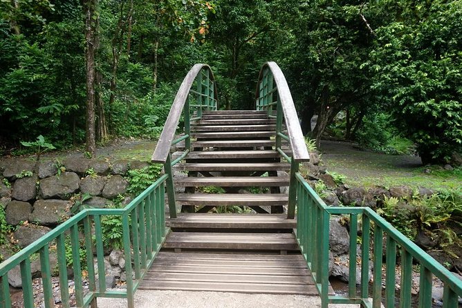 Private Tahiti Circle Island - Waterfalls, Black Sand & Views - Stop 4: Faarumai Waterfalls, Lush Greenery and Towering Cliffs