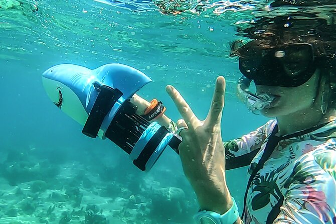 Sea Scooter Snorkel Tour - Lagoon Discovery : Wrecks, Coral Gardens and Tropical Fishies - The Boat Ride, Timing, and Group Size That Keep It Fun