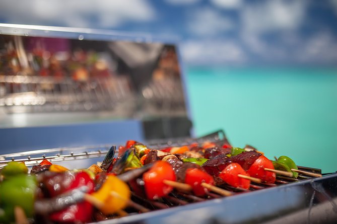 Toa Boat Bora Bora Private Lagoon tour with Lunch on Ambassador Boat - Lunch on board: the BBQ makes it feel like a real day